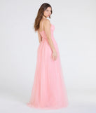 Make a bold statement in the Alia Sequin Applique A-Line Tulle Formal Dress in peach, the perfect spring dress for weddings, cocktail hours, nights out, and/or seasonal celebrations.