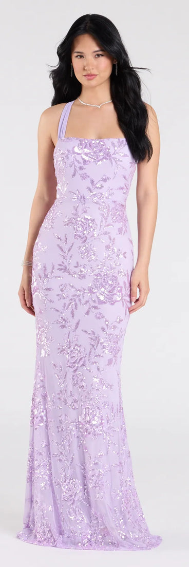 Own the spotlight in the Lexie Floral Sequin Lace-Up Mermaid Dress, a lavender formal dress crafted to deliver luxe style for autumn weddings, Military Balls, or any special event.