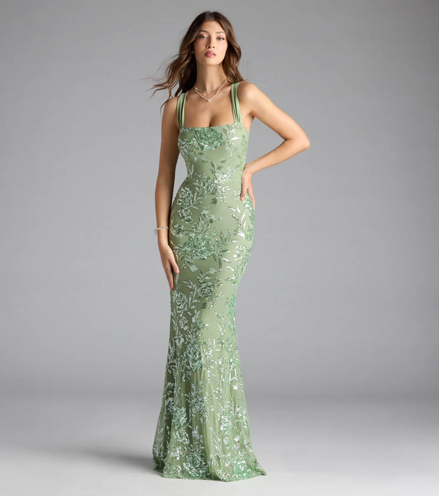 Turn heads at Prom 2025 in this sage green prom dress, where statement-making details meet the iconic style of the Lexie Floral Sequin Lace-Up Mermaid Dress.