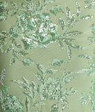 Turn heads at Prom 2025 in this sage green prom dress, where statement-making details meet the iconic style of the Lexie Floral Sequin Lace-Up Mermaid Dress.
