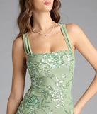 Turn heads at Prom 2025 in this sage green prom dress, where statement-making details meet the iconic style of the Lexie Floral Sequin Lace-Up Mermaid Dress.