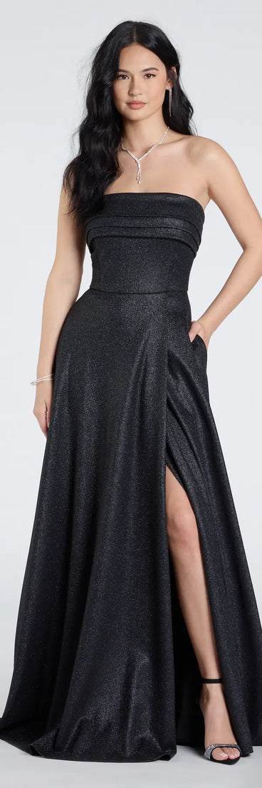 Own the spotlight in the Peyton Strapless Slit A-Line Glitter Formal Dress, a black formal dress crafted to deliver luxe style for autumn weddings, Military Balls, or any special event.