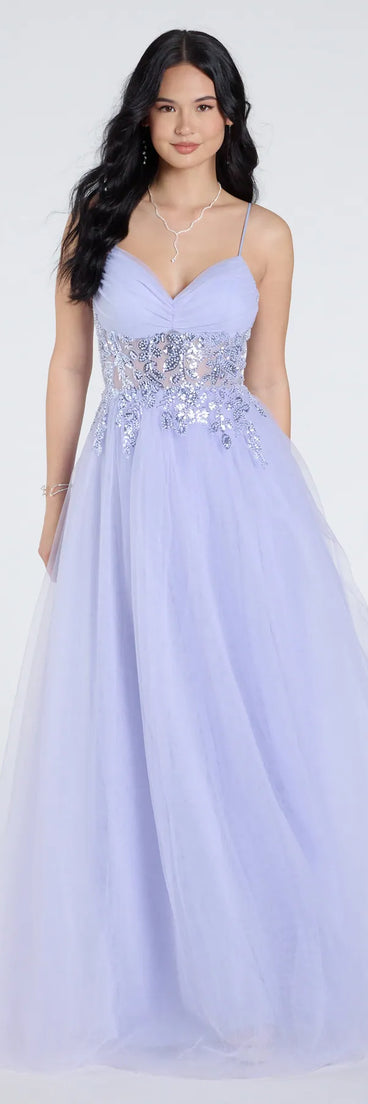 Own the spotlight in the Alia Sequin Applique A-Line Tulle Formal Dress, a periwinkle formal dress crafted to deliver luxe style for autumn weddings, Military Balls, or any special event.