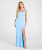 Turn heads at Prom 2025 in this light blue prom dress, where statement-making details meet the iconic style of the Tanya Lace-Up Slit Mermaid Beaded Formal Dress.
