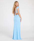 Turn heads at Prom 2025 in this light blue prom dress, where statement-making details meet the iconic style of the Tanya Lace-Up Slit Mermaid Beaded Formal Dress.