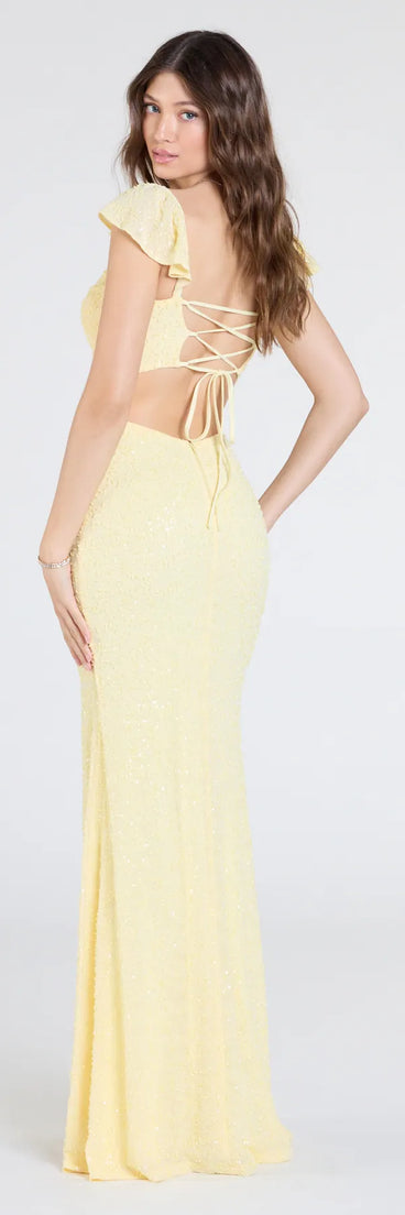 Turn heads at Prom 2025 in this yellow prom dress, where statement-making details meet the iconic style of the Tanya Lace-Up Slit Mermaid Beaded Formal Dress.