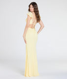 Turn heads at Prom 2025 in this yellow prom dress, where statement-making details meet the iconic style of the Tanya Lace-Up Slit Mermaid Beaded Formal Dress.