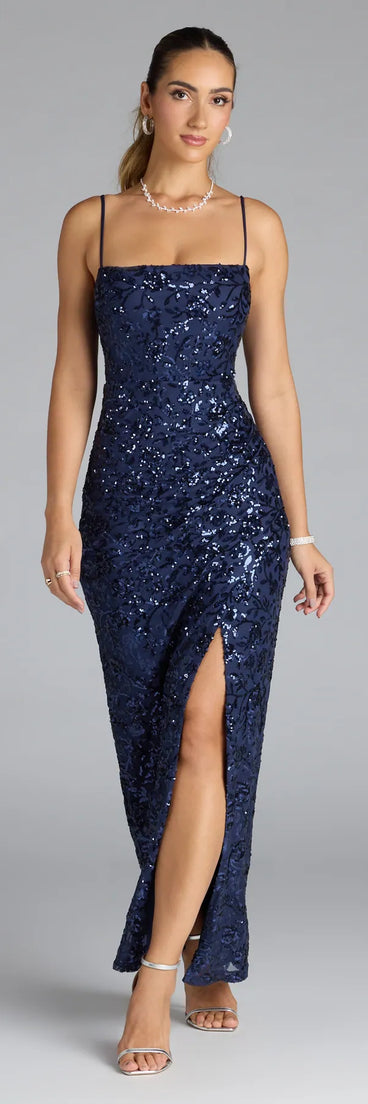 Own the spotlight in the Jolie Sequin Slit Formal Dress, a navy blue formal dress crafted to deliver luxe style for autumn weddings, Military Balls, or any special event.