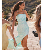 Turn heads at Prom 2025 in this mint green prom dress, where statement-making details meet the iconic style of the Dana Tie Back Slit Sequin Formal Dress.