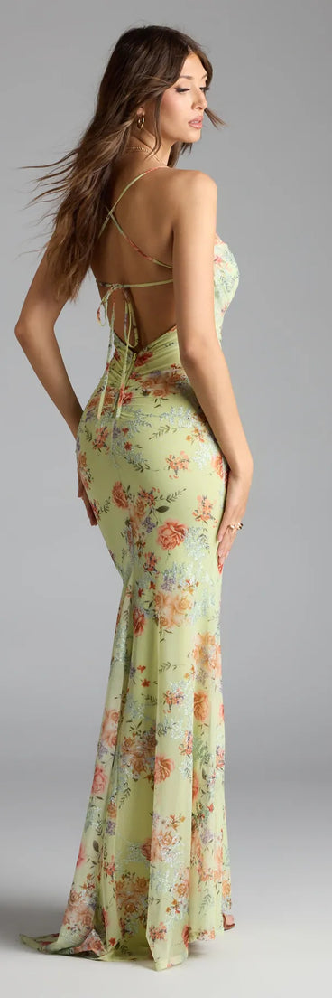 Own the spotlight in the Rosalee Lace-Up Floral Mesh Formal Dress, a sage green formal dress crafted to deliver luxe style for autumn weddings, Military Balls, or any special event.