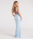 Turn heads at Prom 2025 in this light blue prom dress, where statement-making details meet the iconic style of the Taylor Lace-Up Slit Sequin Formal Dress.