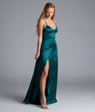 Turn heads at Prom 2025 in this hunter green prom dress, where statement-making details meet the iconic style of the Allegra Lace-Up Slit A-Line Satin Formal Dress.