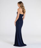 Step into the Prom 2025 dance in the Everly Strapless Slit Mermaid Glitter Formal Dress in navy, a stunning blue prom dress designed to complement any theme with its timeless allure and statement-making style.