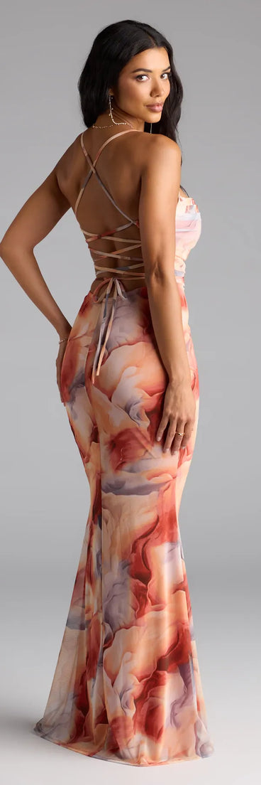 Own the spotlight in the Korey Lace-Up Mermaid Abstract Formal Dress, a rust formal dress crafted to deliver luxe style for autumn weddings, Military Balls, or any special event.