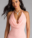 Step into summer looking effortlessly chic in the Alana Halter Beaded Sequin Formal Dress in coral, a must-have Windsor dress for your warm-weather wardrobe.
