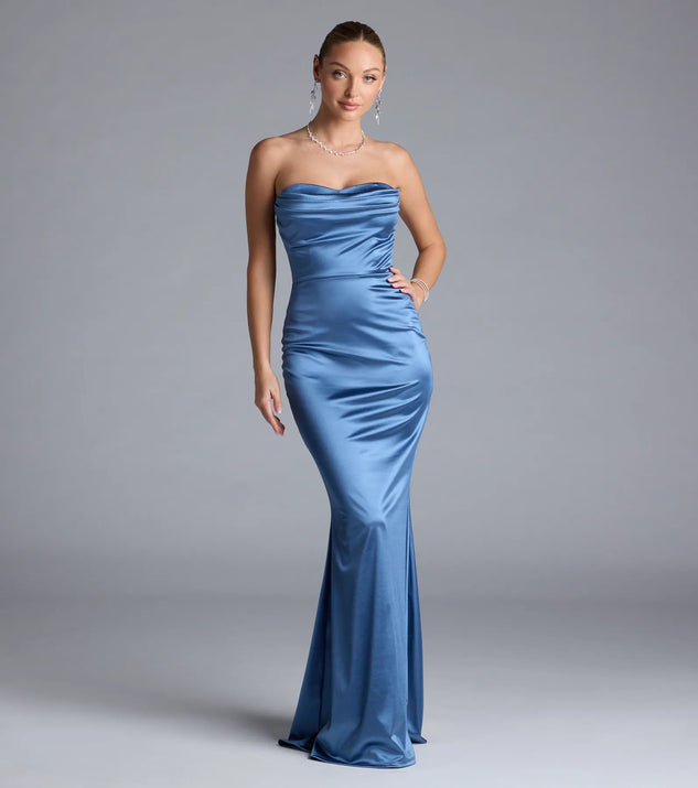 Turn heads at Prom 2025 in this denim blue prom dress, where statement-making details meet the iconic style of the Priscilla Formal Satin Strapless Mermaid Dress.