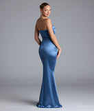Turn heads at Prom 2025 in this denim blue prom dress, where statement-making details meet the iconic style of the Priscilla Formal Satin Strapless Mermaid Dress.