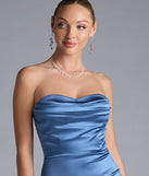 Turn heads at Prom 2025 in this denim blue prom dress, where statement-making details meet the iconic style of the Priscilla Formal Satin Strapless Mermaid Dress.