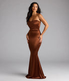 Step into summer looking effortlessly chic in the Priscilla Formal Satin Strapless Mermaid Dress in brown, a must-have Windsor dress for your warm-weather wardrobe.