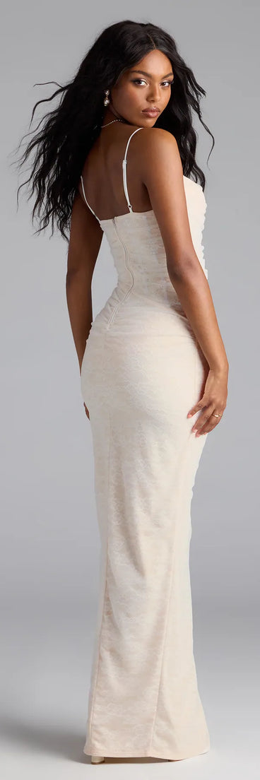 Own the spotlight in the Kristana Corset Slit Mesh Lace Formal Dress, a ivory formal dress crafted to deliver luxe style for autumn weddings, Military Balls, or any special event.