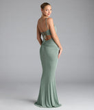 Turn heads at Prom 2025 in this sage green prom dress, where statement-making details meet the iconic style of the Kylie Lace-Up Mermaid Glitter Formal Dress.