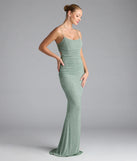 Turn heads at Prom 2025 in this sage green prom dress, where statement-making details meet the iconic style of the Kylie Lace-Up Mermaid Glitter Formal Dress.