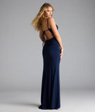Own the spotlight in the Edna Open Back Mermaid Formal Dress, a navy blue formal dress crafted to deliver luxe style for summer weddings, Army Balls, or any special event.