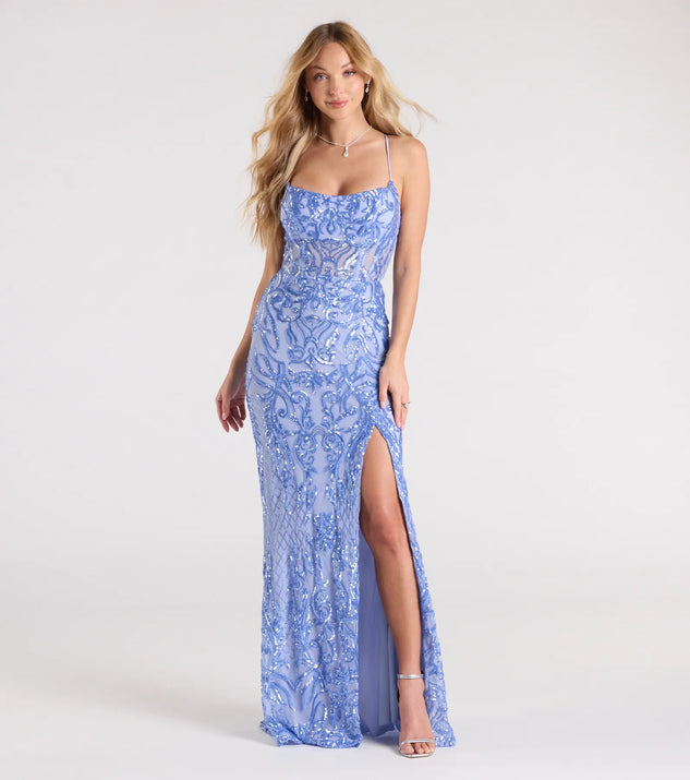 Turn heads at Prom 2025 in this periwinkle prom dress, where statement-making details meet the iconic style of the Lucille Lace-Up Corset Sequin Formal Dress.