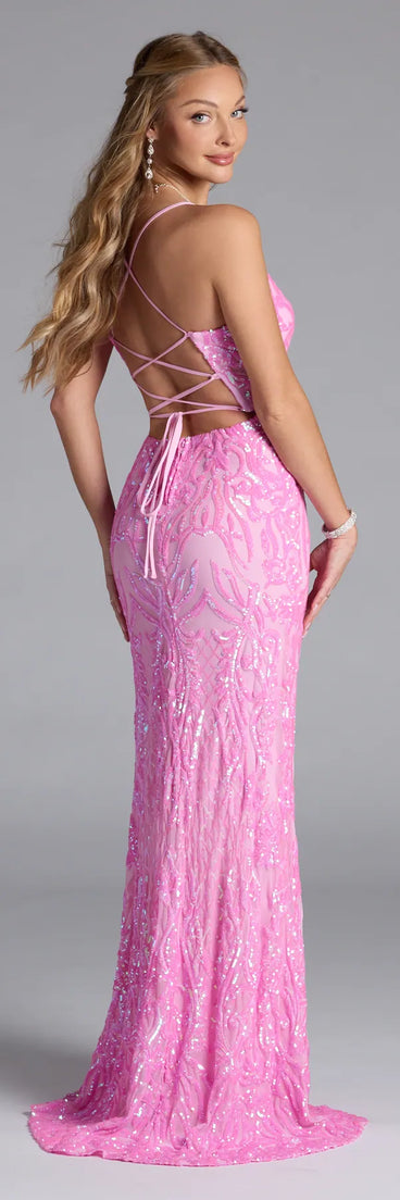Turn heads at Prom 2025 in this pink prom dress, where statement-making details meet the iconic style of the Lani Lace-Up Slit Mermaid Sequin Formal Dress.