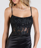 Turn heads at Prom 2025 in this black prom dress, where statement-making details meet the iconic style of the Lucia Lace Corset Slit Satin Formal Dress.