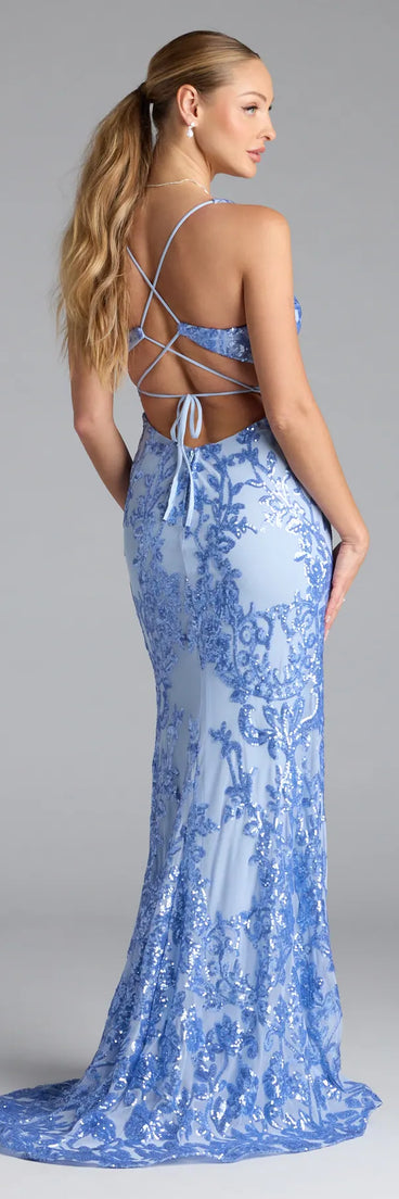 Turn heads at Prom 2025 in this periwinkle prom dress, where statement-making details meet the iconic style of the Jaide Lace-Up Corset Slit Sequin Formal Dress.