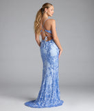 Turn heads at Prom 2025 in this periwinkle prom dress, where statement-making details meet the iconic style of the Jaide Lace-Up Corset Slit Sequin Formal Dress.