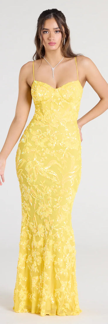 Own the spotlight in the Alandra Sweetheart Mermaid Sequin Formal Dress, a yellow formal dress crafted to deliver luxe style for autumn weddings, Military Balls, or any special event.