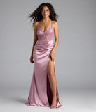 Turn heads at Prom 2025 in this mauve prom dress, where statement-making details meet the iconic style of the Tatianna Lace-Up Applique Slit Satin Formal Dress.