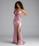 Turn heads at Prom 2025 in this mauve prom dress, where statement-making details meet the iconic style of the Tatianna Lace-Up Applique Slit Satin Formal Dress.