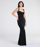 The Shelia Lace-Up Mermaid Glitter Formal Dress is a show-stopping black prom dress, offering a sleek, slimming silhouette that enhances your natural beauty for an unforgettable night.