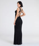 The Shelia Lace-Up Mermaid Glitter Formal Dress is a show-stopping black prom dress, offering a sleek, slimming silhouette that enhances your natural beauty for an unforgettable night.