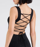 The Shelia Lace-Up Mermaid Glitter Formal Dress is a show-stopping black prom dress, offering a sleek, slimming silhouette that enhances your natural beauty for an unforgettable night.