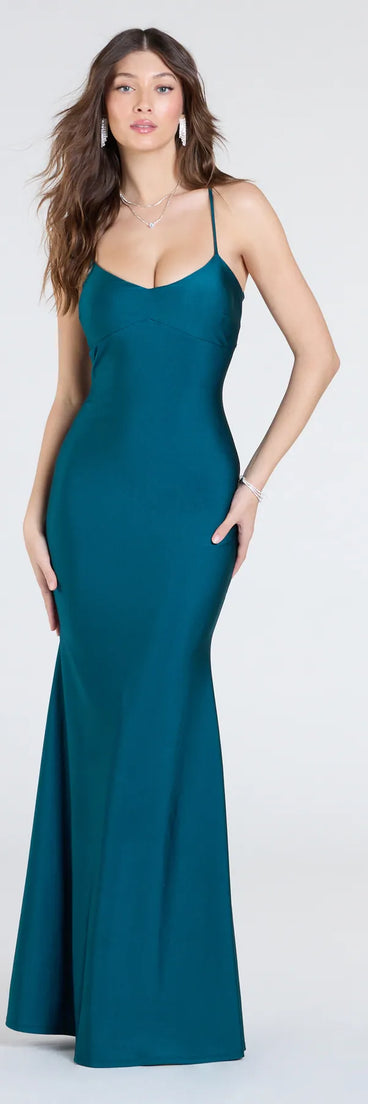 Own the spotlight in the Mindy Strappy Back Mermaid Formal Dress, a hunter green formal dress crafted to deliver luxe style for autumn weddings, Military Balls, or any special event.