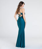 The Mindy Strappy Back Mermaid Formal Dress in hunter is a stunning green prom dress designed to capture attention with its fresh or bold color and effortlessly stylish silhouette.