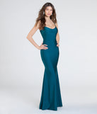 The Mindy Strappy Back Mermaid Formal Dress in hunter is a stunning green prom dress designed to capture attention with its fresh or bold color and effortlessly stylish silhouette.