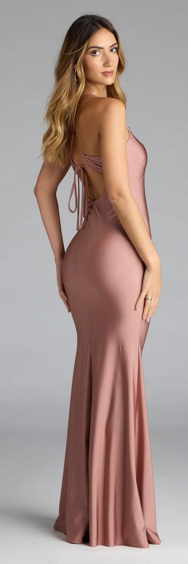 Turn heads at Prom 2025 in this mauve prom dress, where statement-making details meet the iconic style of the Mindy Strappy Back Mermaid Formal Dress.