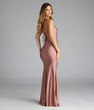 Turn heads at Prom 2025 in this mauve prom dress, where statement-making details meet the iconic style of the Mindy Strappy Back Mermaid Formal Dress.