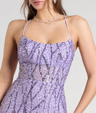 Turn heads at Prom 2025 in this lavender prom dress, where statement-making details meet the iconic style of the Meghan Lace-Up Corset Sequin Bead Formal Dress.