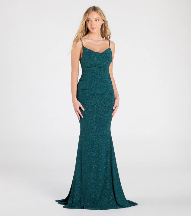 The Corrina Cowl Neck Mermaid Glitter Formal Dress in hunter is a stunning green prom dress designed to capture attention with its fresh or bold color and effortlessly stylish silhouette.