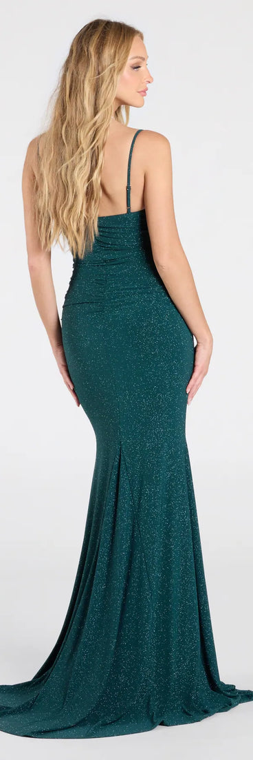 The Corrina Cowl Neck Mermaid Glitter Formal Dress in hunter is a stunning green prom dress designed to capture attention with its fresh or bold color and effortlessly stylish silhouette.