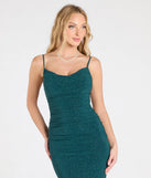 The Corrina Cowl Neck Mermaid Glitter Formal Dress in hunter is a stunning green prom dress designed to capture attention with its fresh or bold color and effortlessly stylish silhouette.
