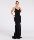 The Corrina Cowl Neck Mermaid Glitter Formal Dress is a show-stopping black prom dress, offering a sleek, slimming silhouette that enhances your natural beauty for an unforgettable night.