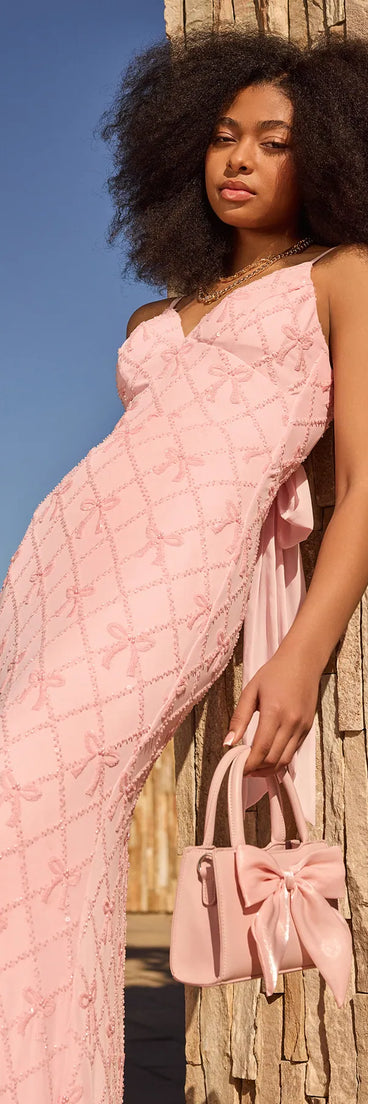 Own the spotlight in the Amanda Tie-Back Mermaid Bow Formal Dress, a pink formal dress crafted to deliver luxe style for autumn weddings, Military Balls, or any special event.