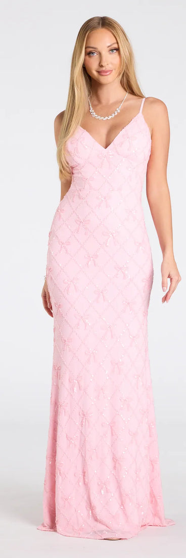 The Amanda Tie-Back Mermaid Bow Formal Dress in luxe pink fabric, a stunning prom dress with statement details designed to make a bold impression at Prom 2025.